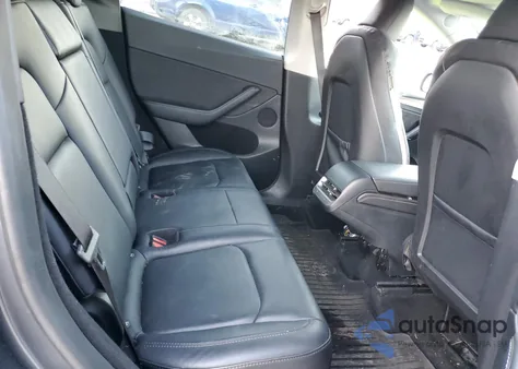 2023 Tesla Model Y из США, поврежденный, VIN 7SAYGDEE4PF899390